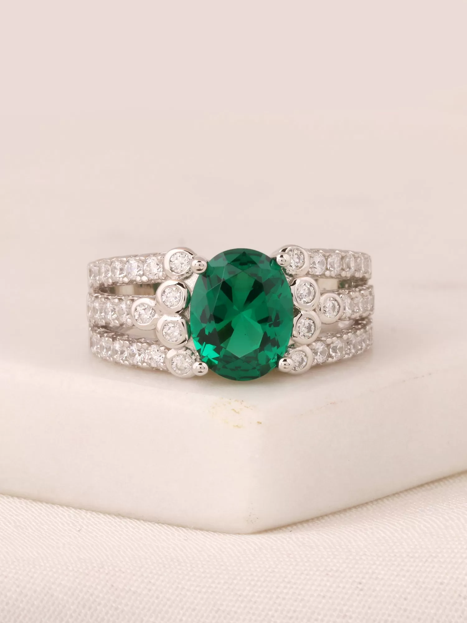 2.5 Carat Oval Emerald Solitaire Cluster Ring